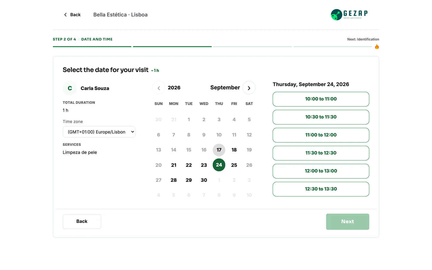The business’s public booking page, showing the client’s time zone and the day’s available time slots
