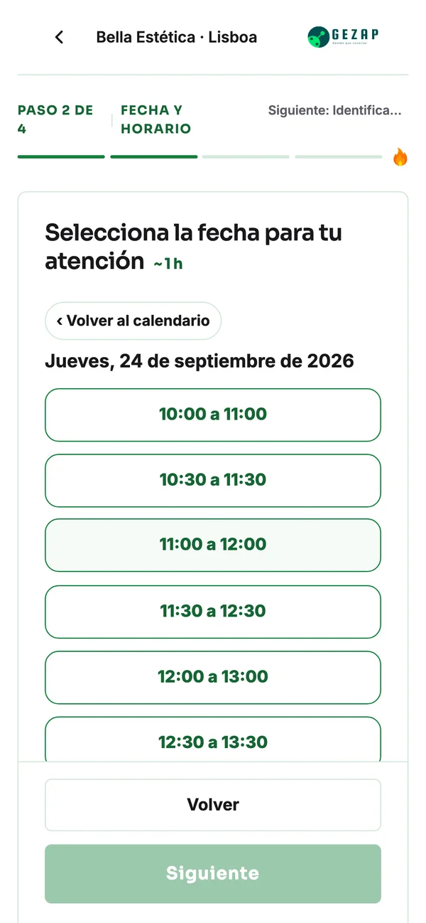 Celular con la página pública de agendamiento de la sede de Lisboa, mostrando los horarios en la zona horaria de Lisboa