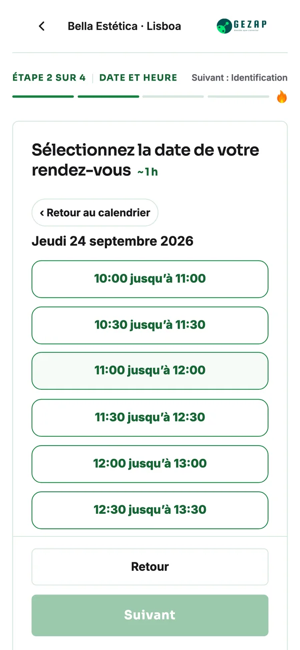 Téléphone affichant la page publique de prise de rendez-vous de l’établissement de Lisbonne, avec les créneaux horaires dans le fuseau de Lisbonne