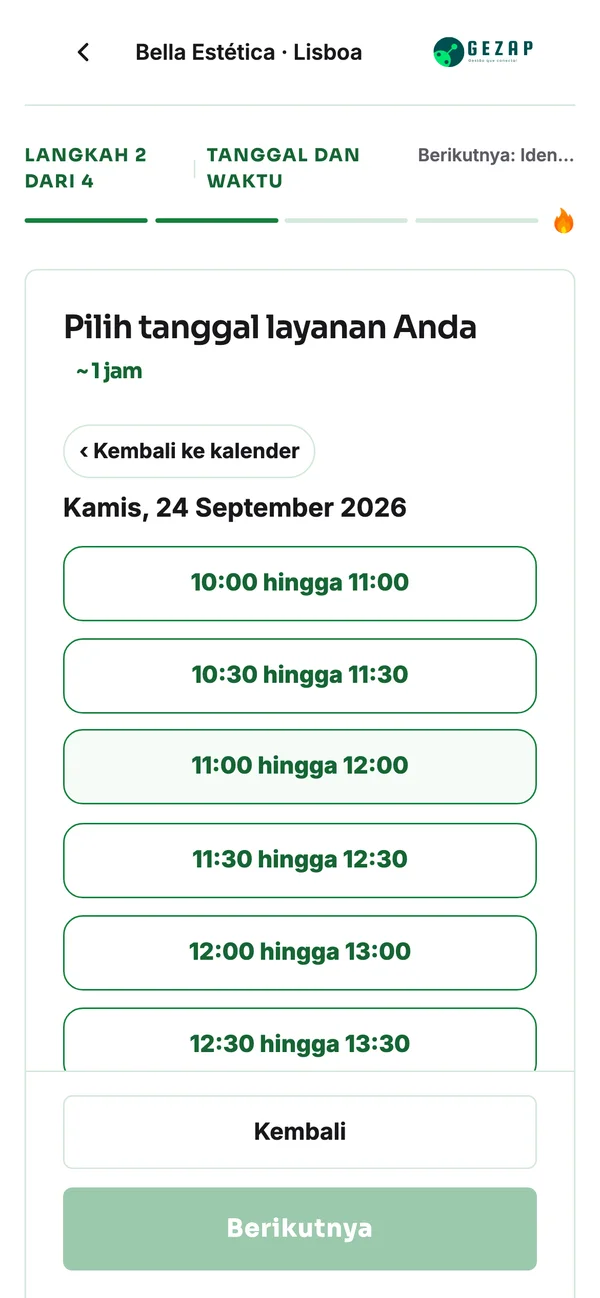 Ponsel dengan halaman publik untuk membuat janji temu di unit Lisboa, menampilkan waktu dalam zona waktu Lisboa